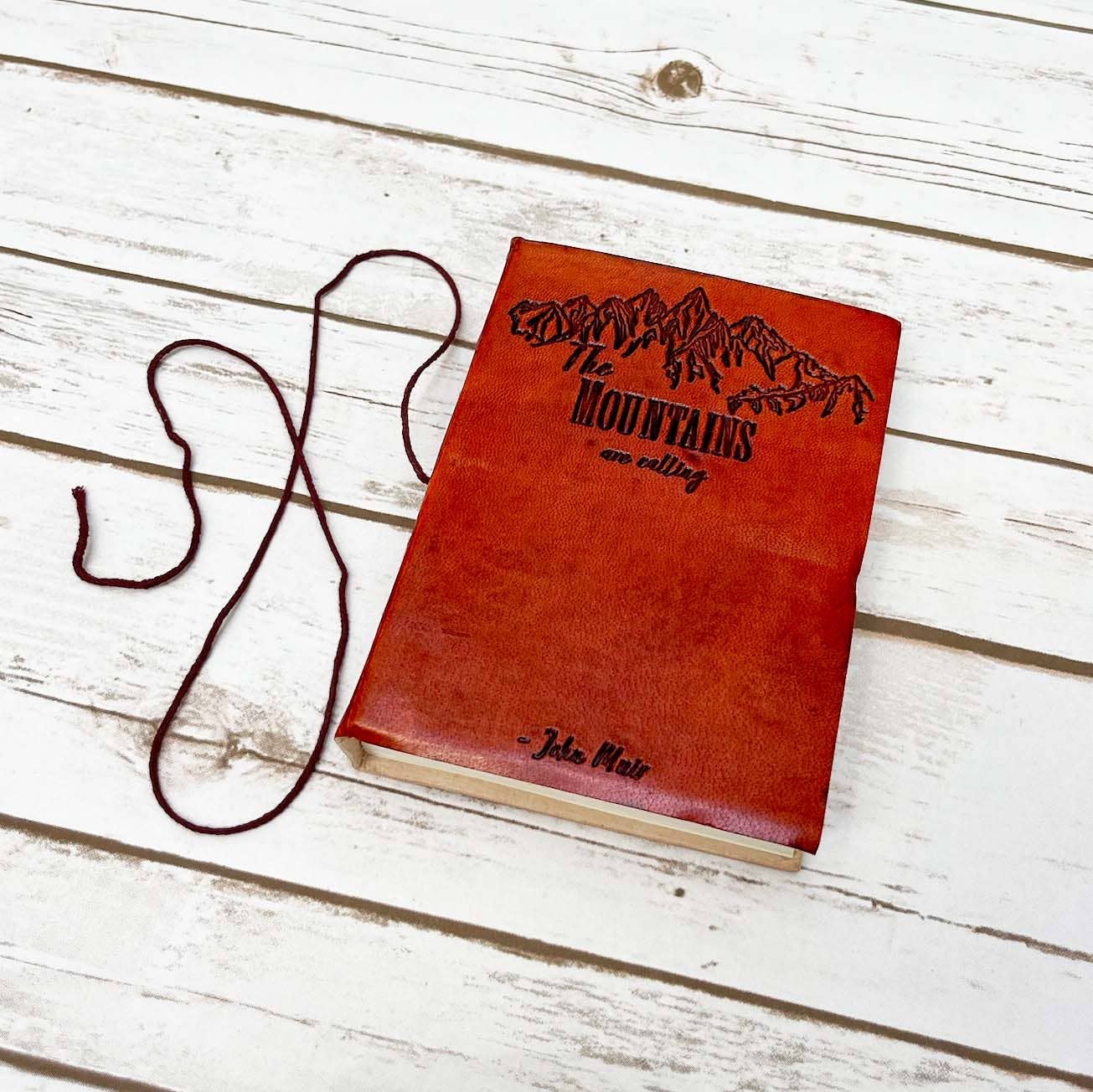 The Mountains Are Calling John Muir Quote Leather Journal: Brown